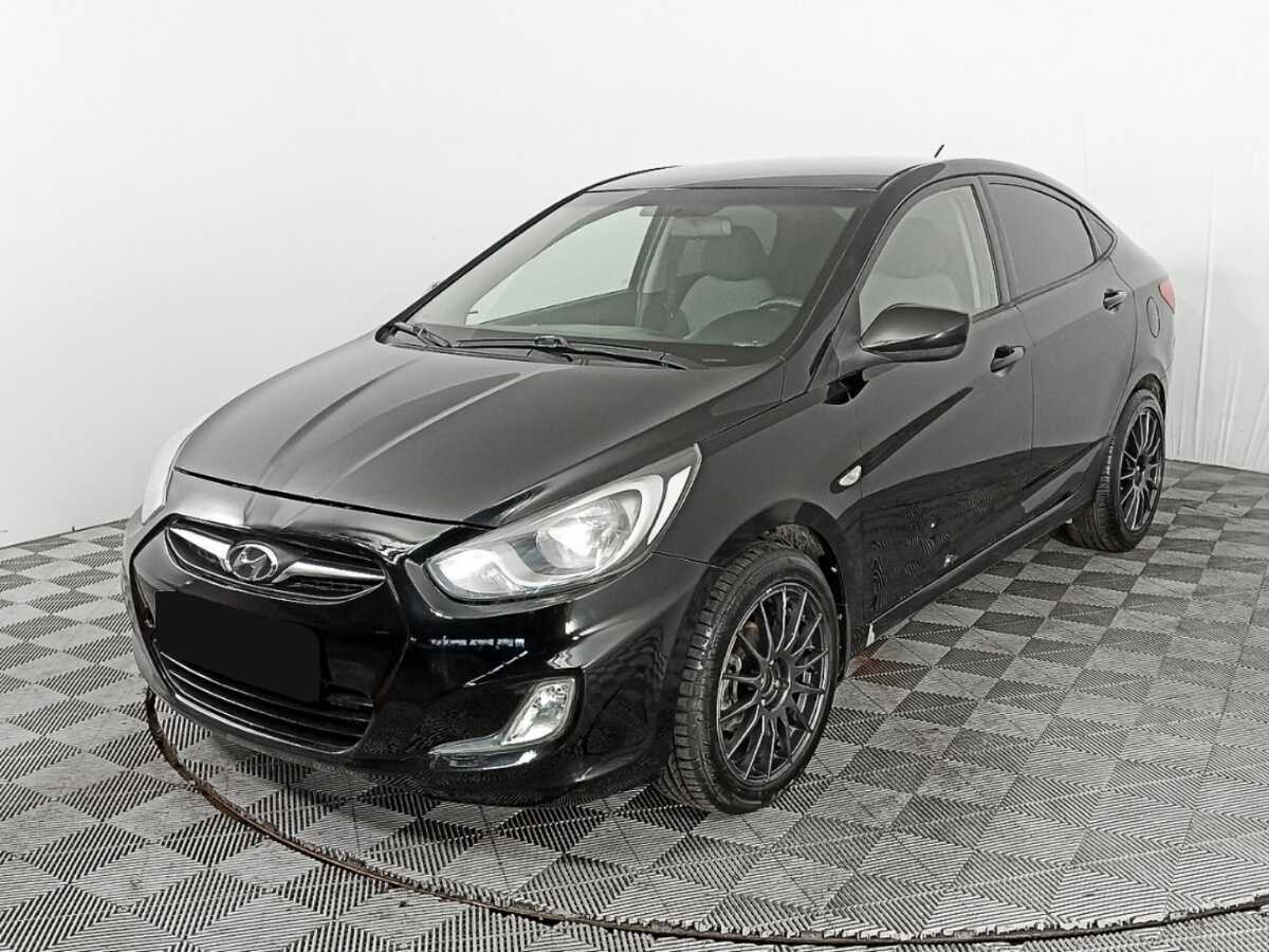 Hyundai Solaris 2013 года с пробегом. Посмотреть фото