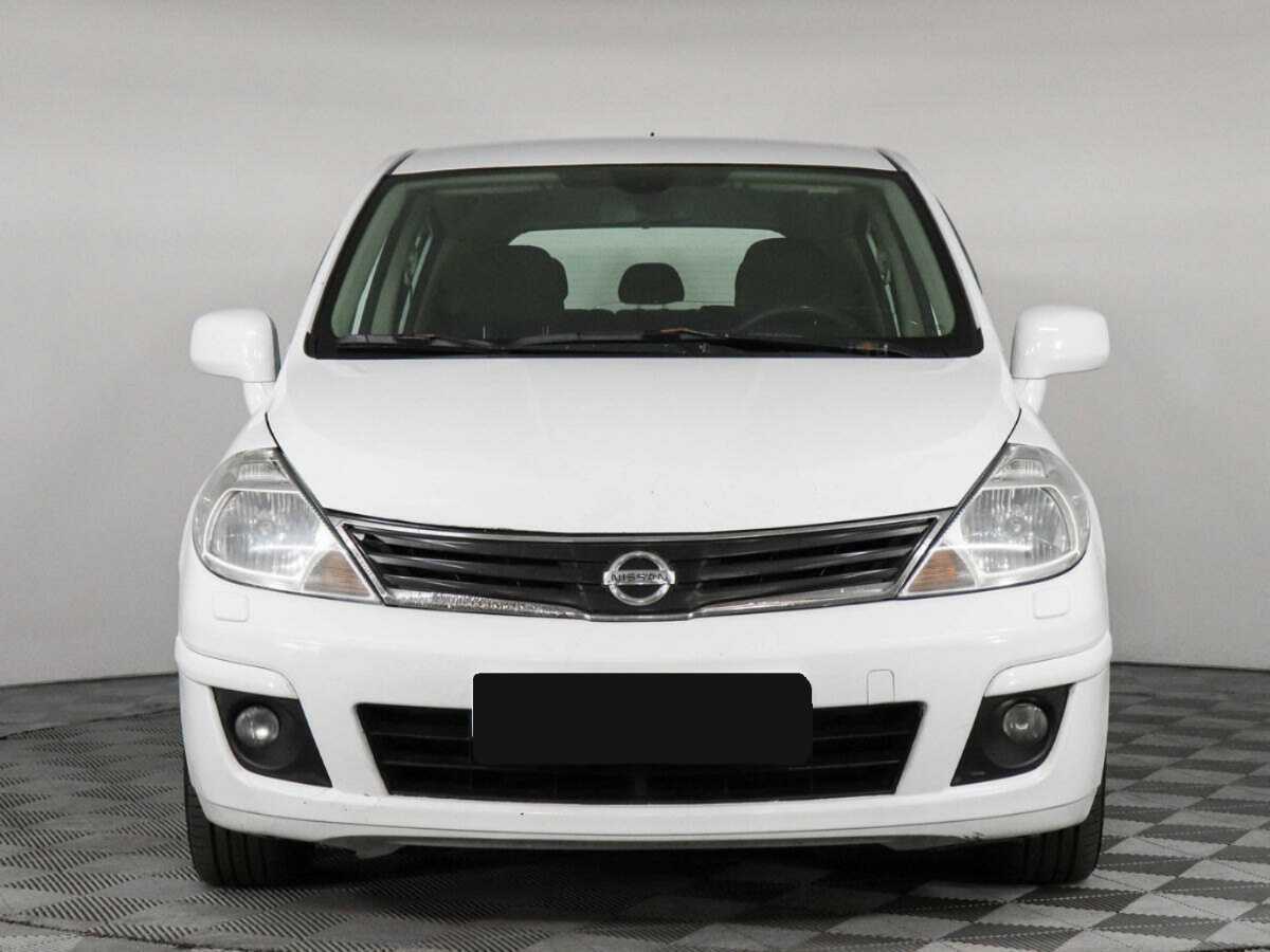 Nissan Tiida 2013 года с пробегом. Фото: #1