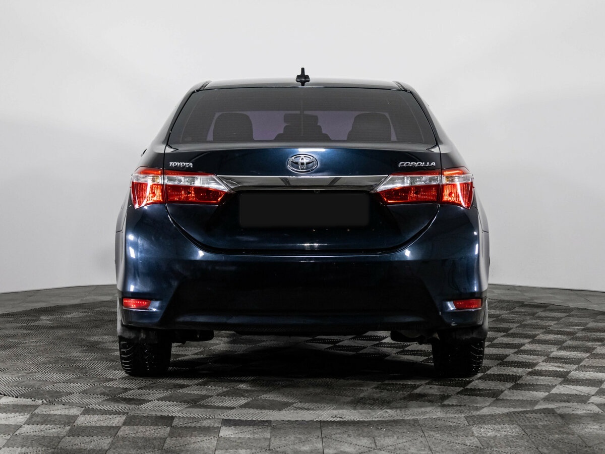 Toyota Corolla 2014 года с пробегом. Фото: #4