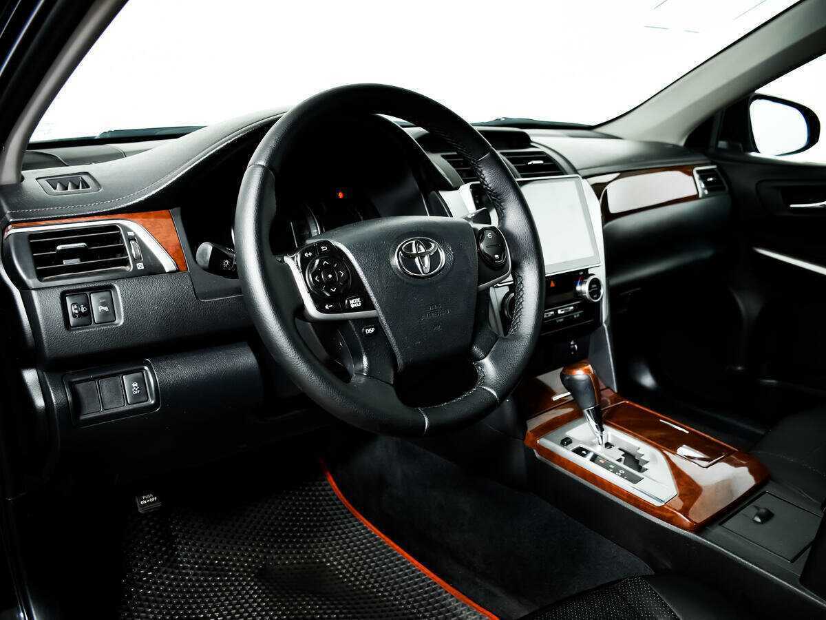 Toyota Camry 2013 года с пробегом. Фото: #12