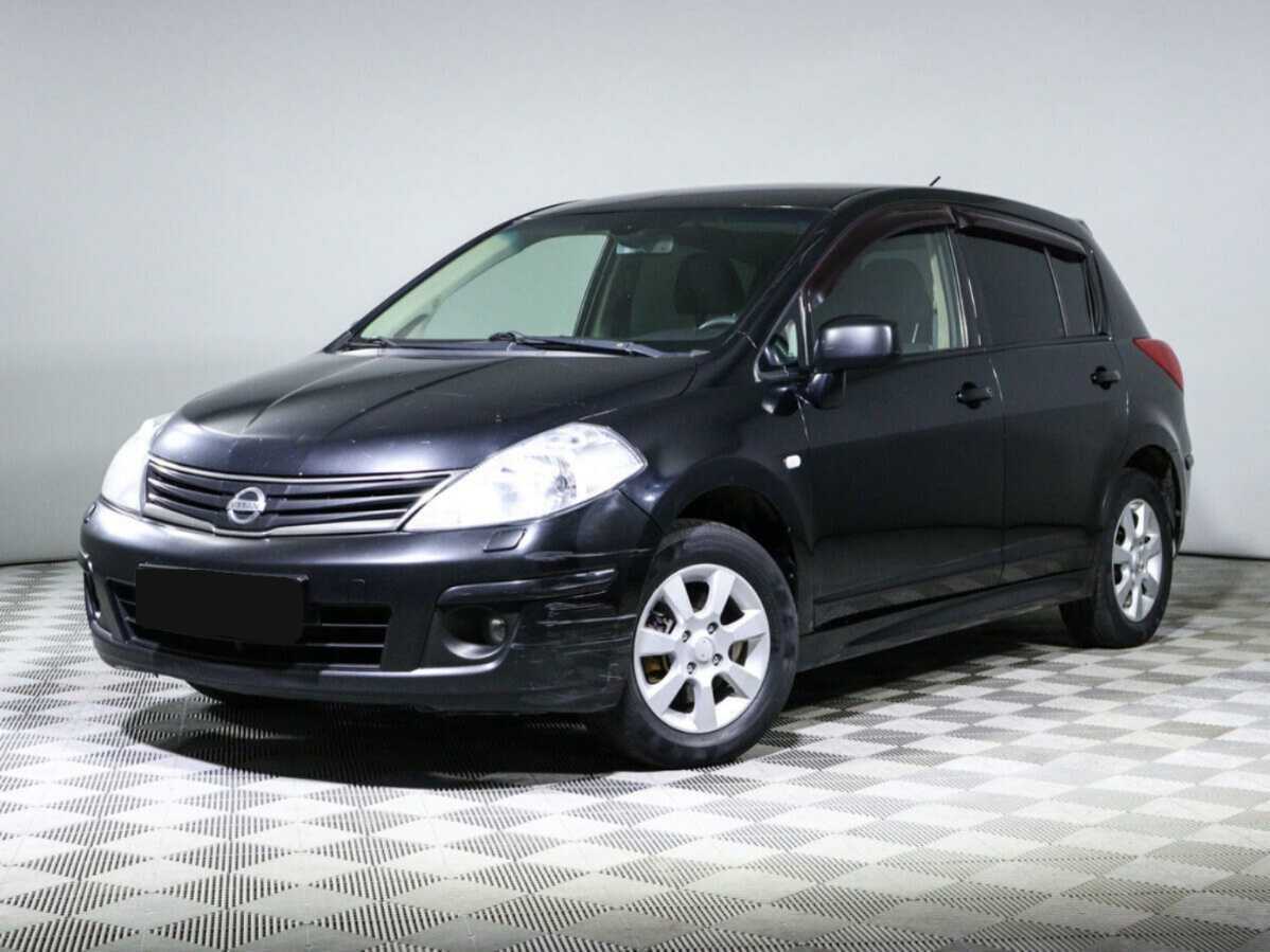Nissan Tiida 2013 года с пробегом. Посмотреть фото