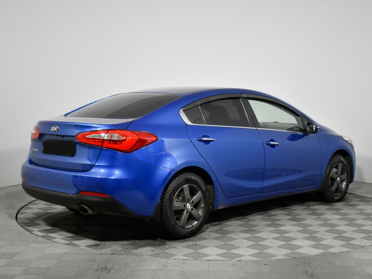 Kia Cerato 2014 года с пробегом. Фото: #4