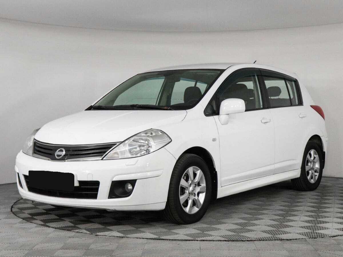 Nissan Tiida 2013 года с пробегом. Фото: #0