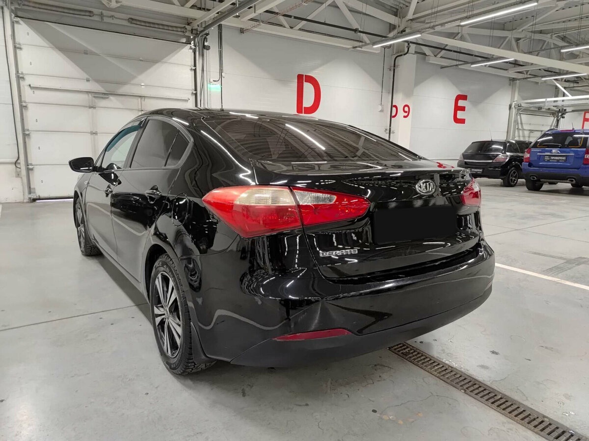 Kia Cerato 2013 года с пробегом. Фото: #6