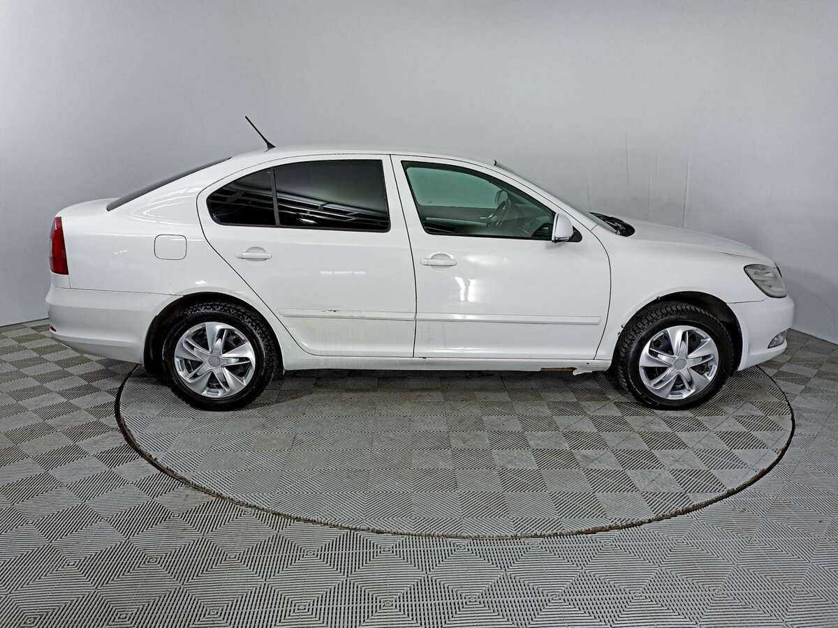 Skoda Octavia 2012 года с пробегом. Фото: #3