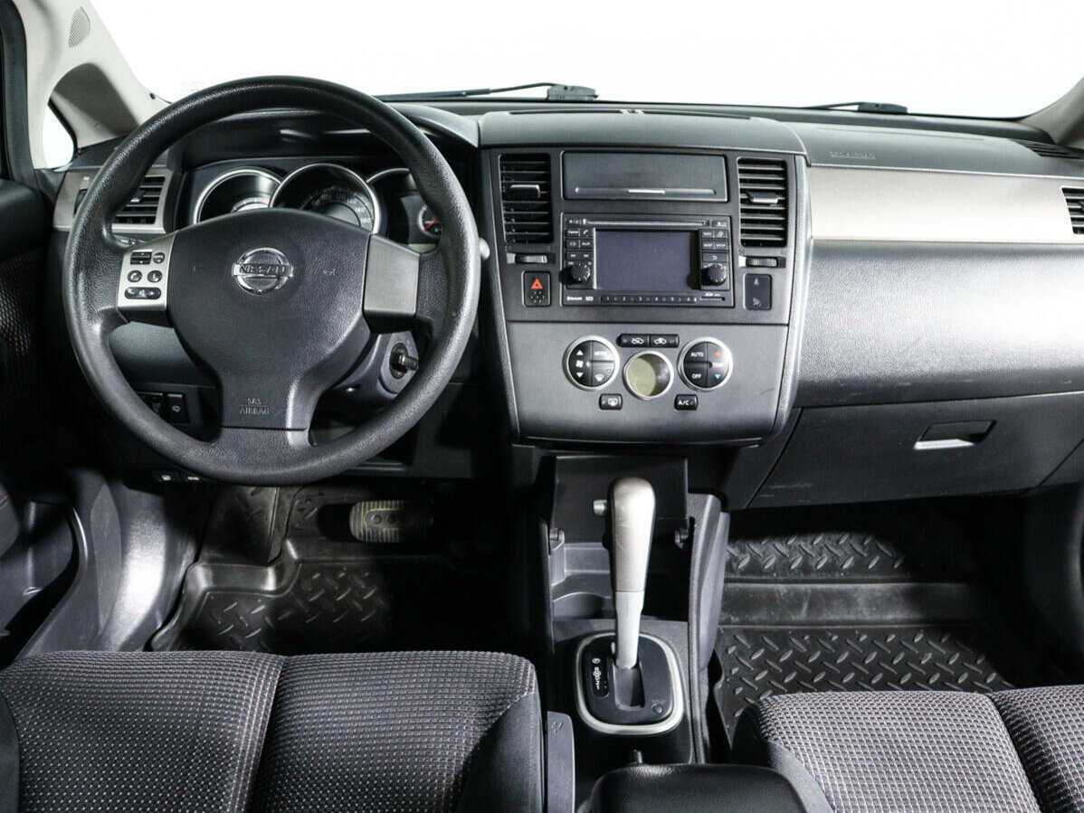 Nissan Tiida 2013 года с пробегом. Фото: #9