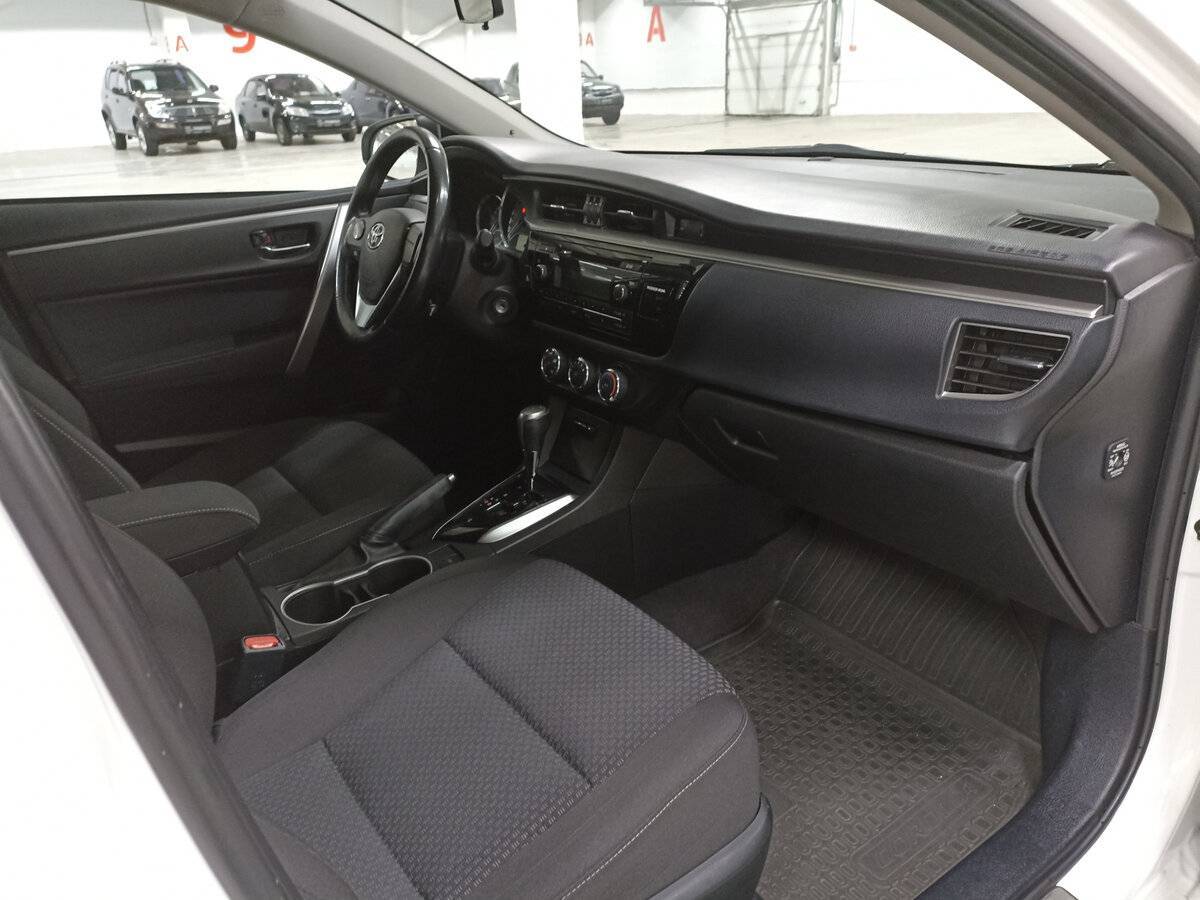 Toyota Corolla 2013 года с пробегом. Фото: #10