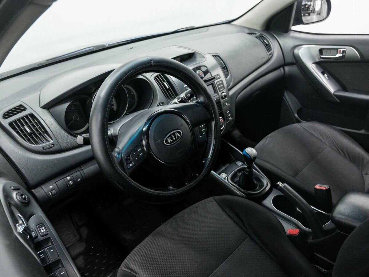 Kia Cerato 2012 года с пробегом. Фото: #12