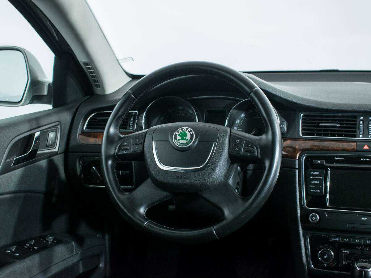 Skoda Superb 2013 года с пробегом. Фото: #13
