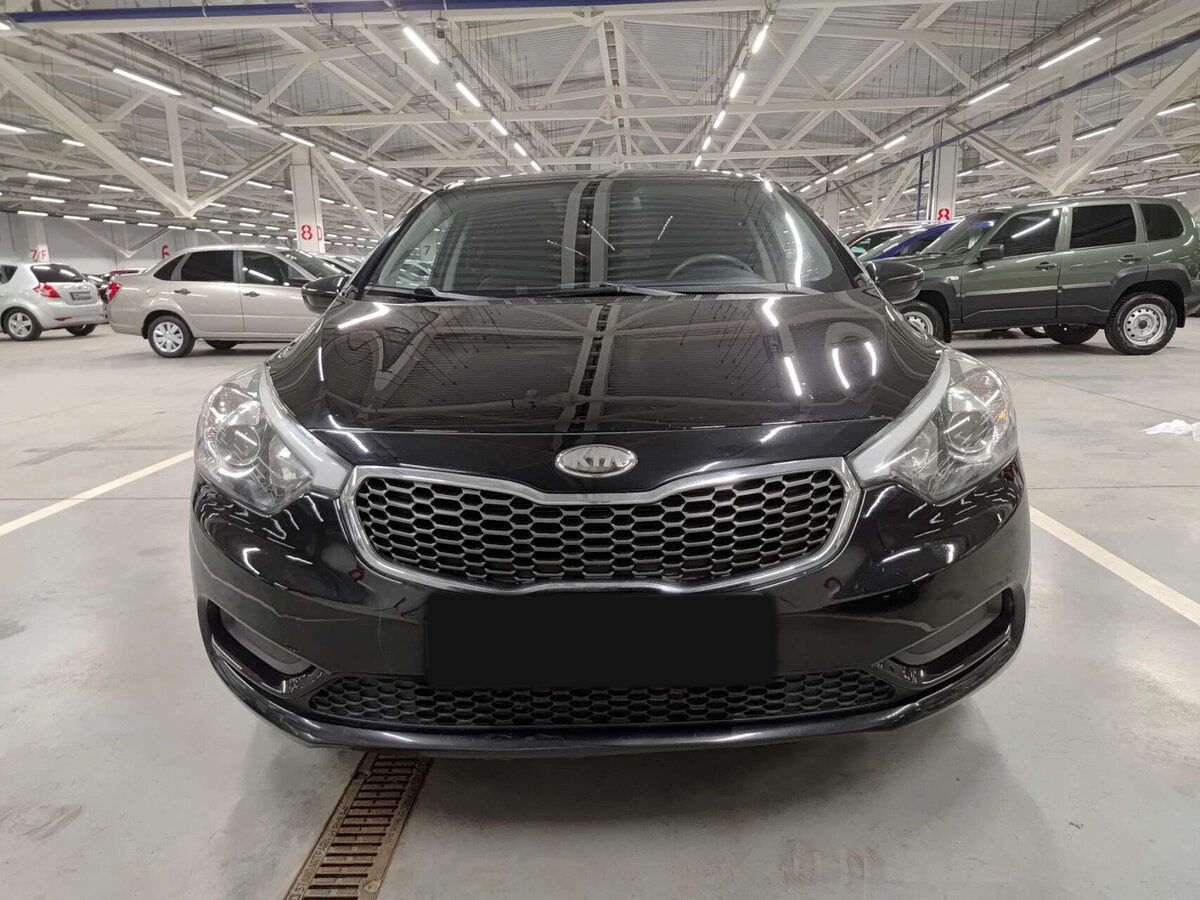 Kia Cerato 2013 года с пробегом. Фото: #1