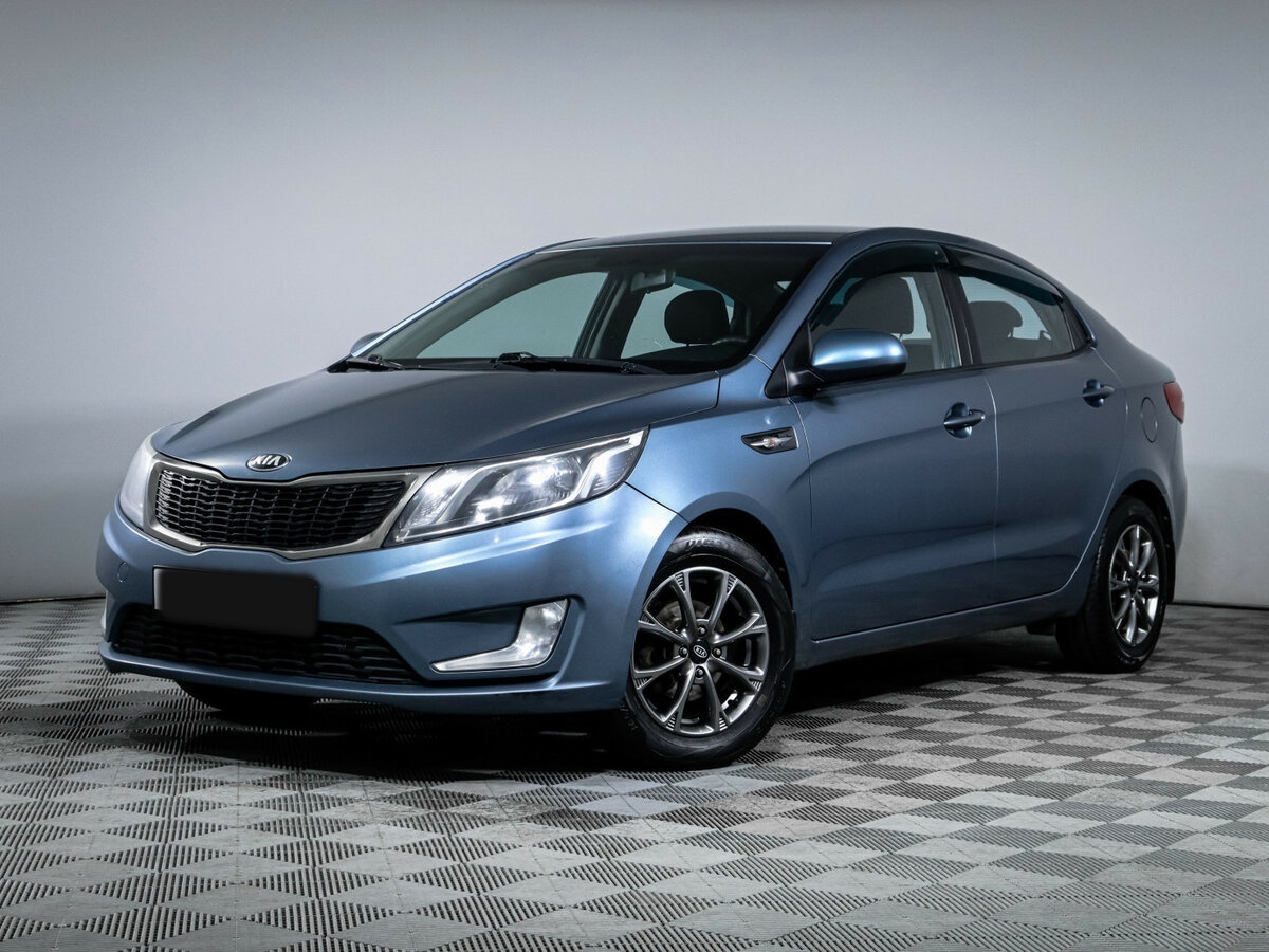 Kia Rio 2013 года с пробегом. Посмотреть фото