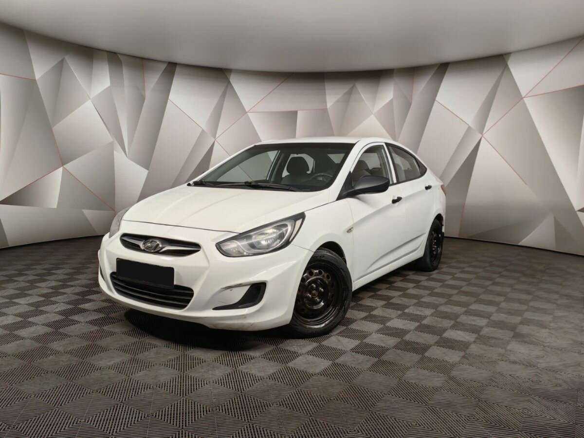 Hyundai Solaris 2013 года с пробегом. Посмотреть фото
