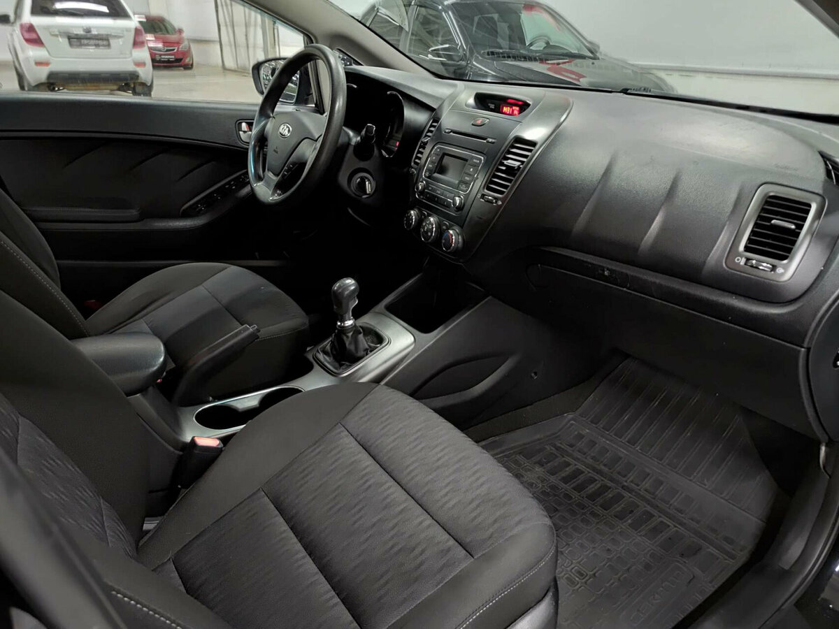 Kia Cerato 2013 года с пробегом. Фото: #10