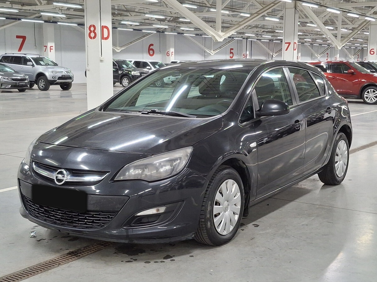 Opel Astra 2013 года с пробегом. Посмотреть фото