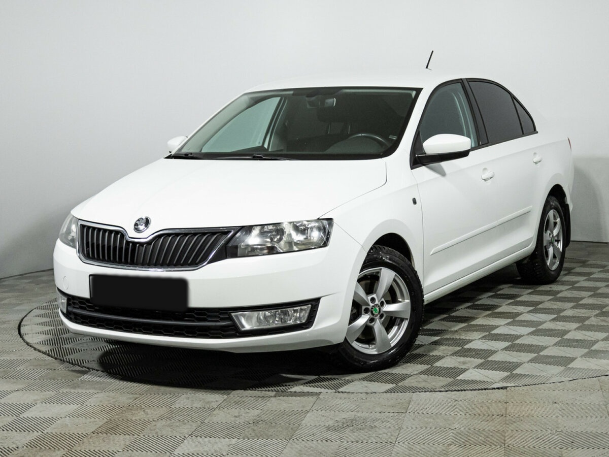 Skoda Rapid 2016 года с пробегом. Посмотреть фото