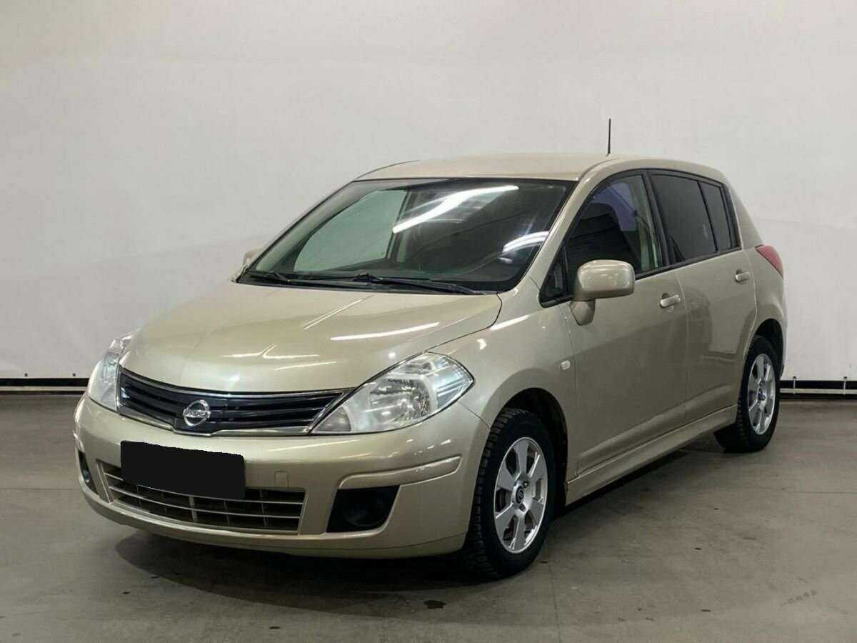 Nissan Tiida 2013 года с пробегом. Фото: #0