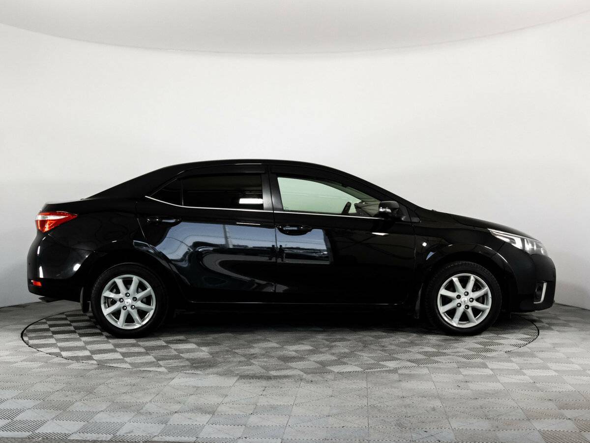 Toyota Corolla 2013 года с пробегом. Фото: #3