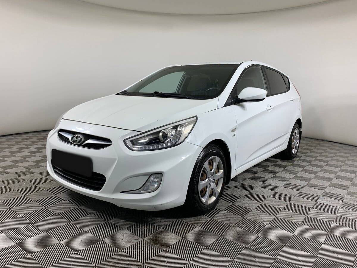 Hyundai Solaris 2013 года с пробегом. Посмотреть фото