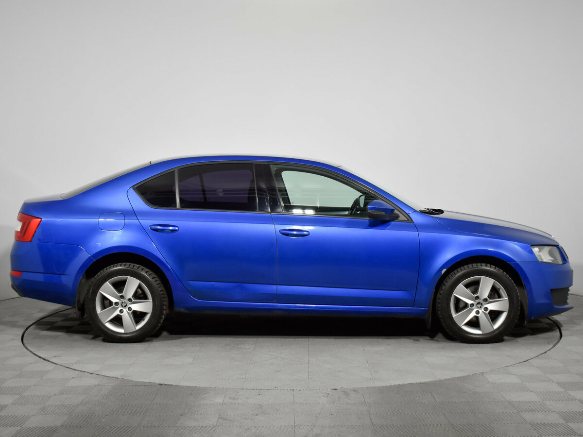 Skoda Octavia 2013 года с пробегом. Фото: #3
