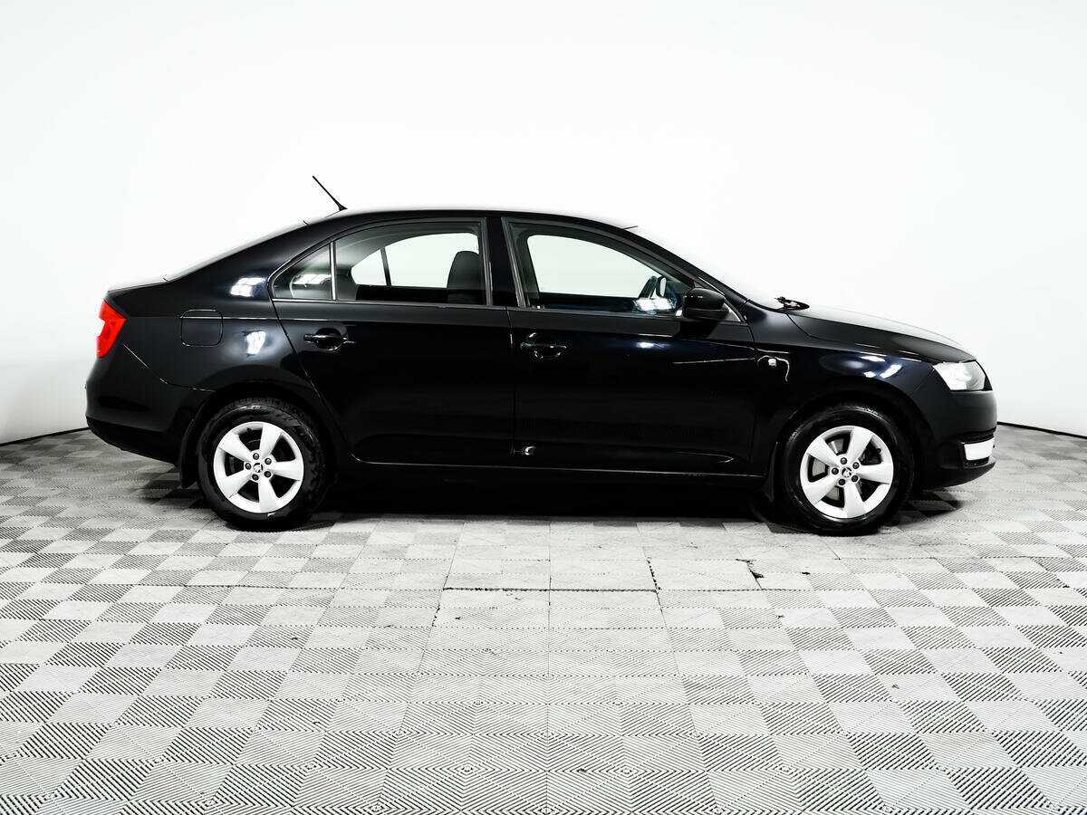 Skoda Rapid 2014 года с пробегом. Фото: #3