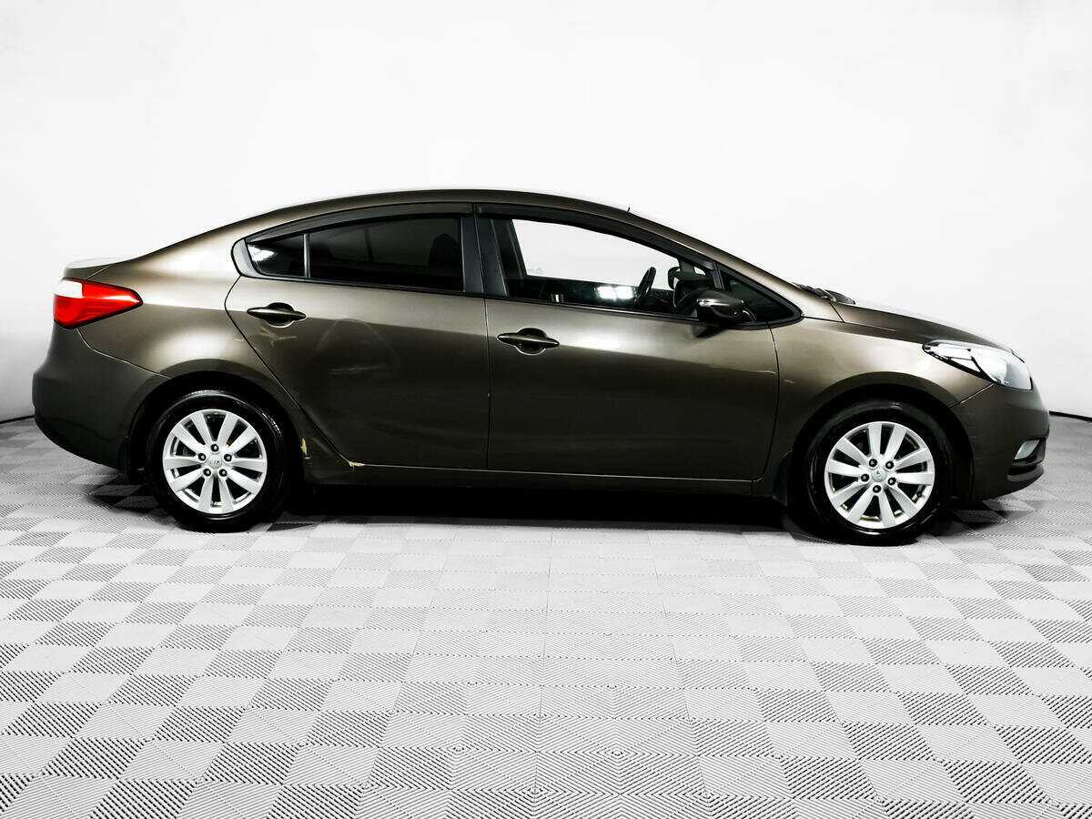 Kia Cerato 2014 года с пробегом. Фото: #3