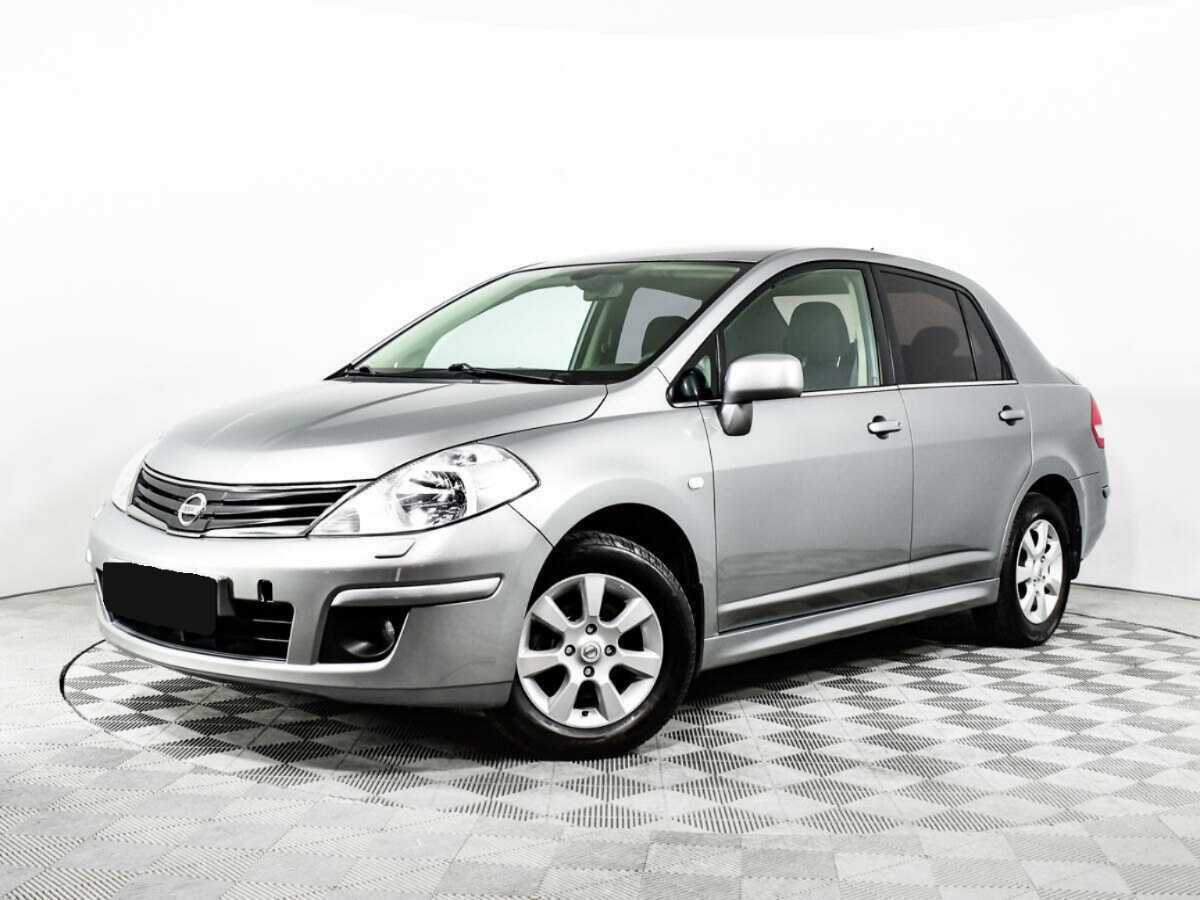 Nissan Tiida 2013 года с пробегом. Посмотреть фото