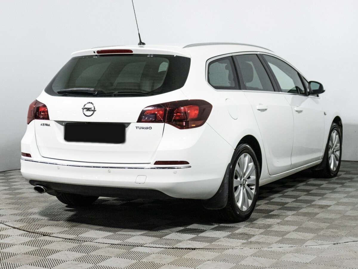 Opel Astra 2014 года с пробегом. Фото: #4