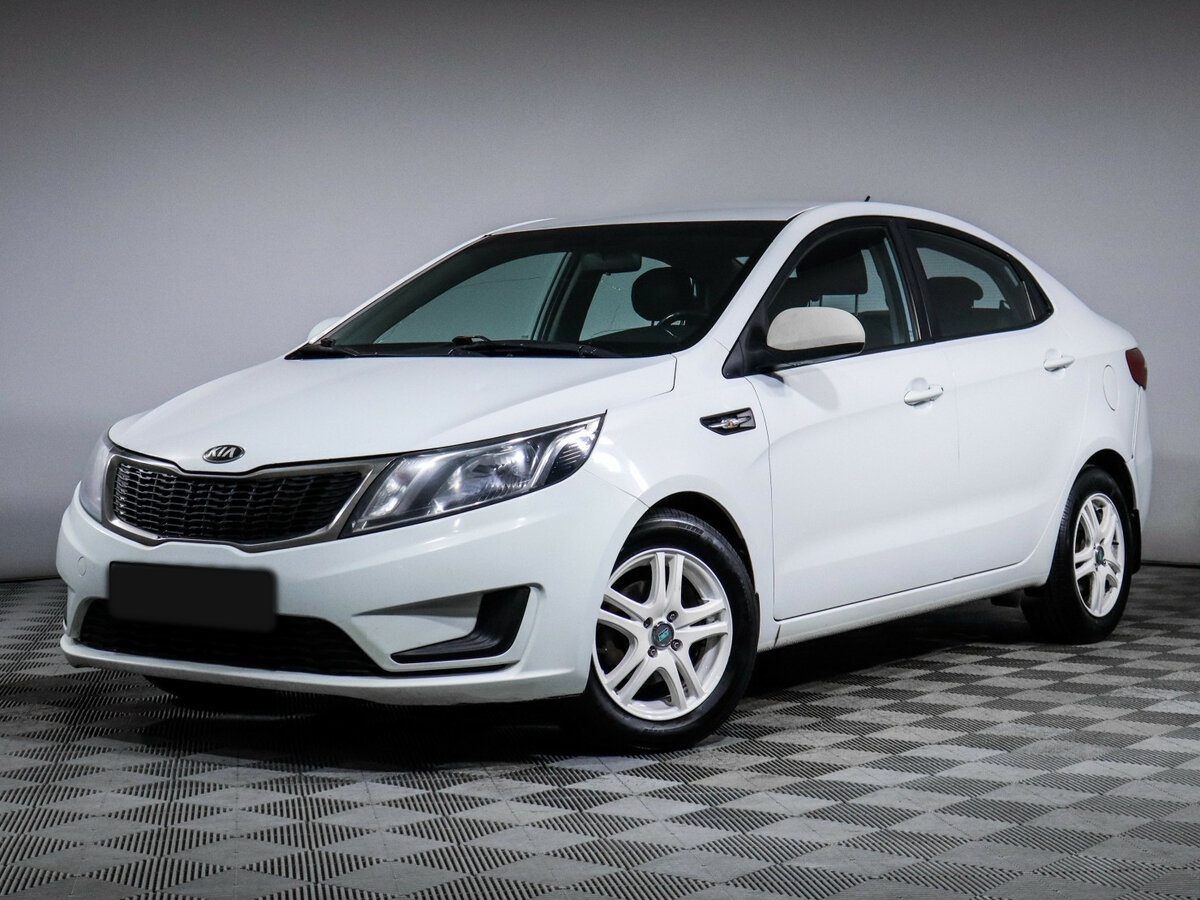 Kia Rio 2014 года с пробегом. Посмотреть фото