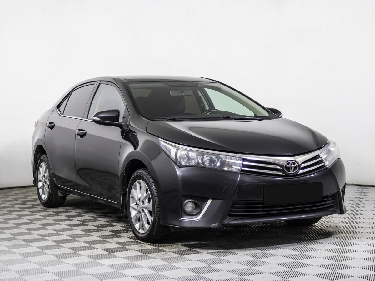 Toyota Corolla 2013 года с пробегом. Фото: #2