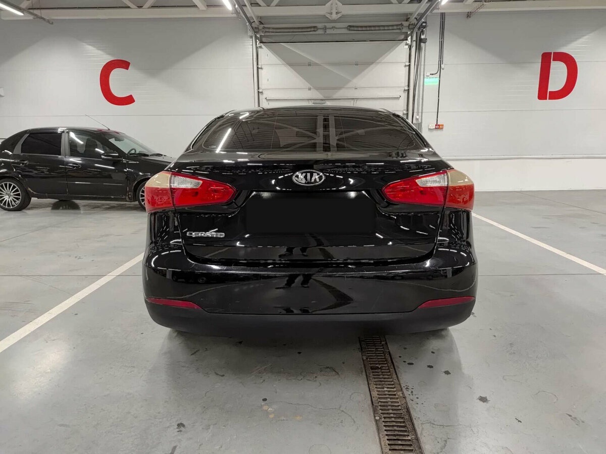 Kia Cerato 2013 года с пробегом. Фото: #5