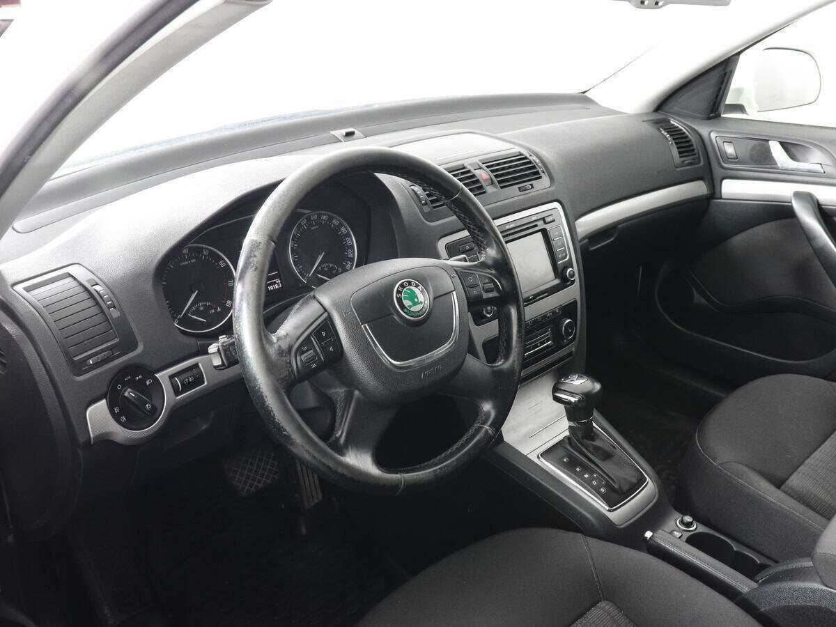 Skoda Octavia 2012 года с пробегом. Фото: #8