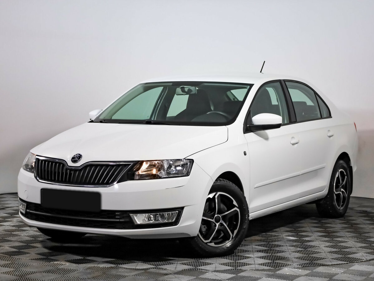 Skoda Rapid 2015 года с пробегом. Посмотреть фото