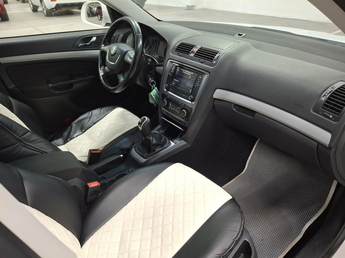 Skoda Octavia 2012 года с пробегом. Фото: #10