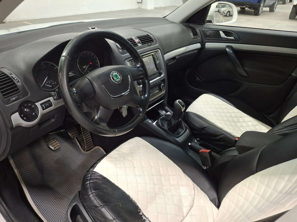 Skoda Octavia 2012 года с пробегом. Фото: #15
